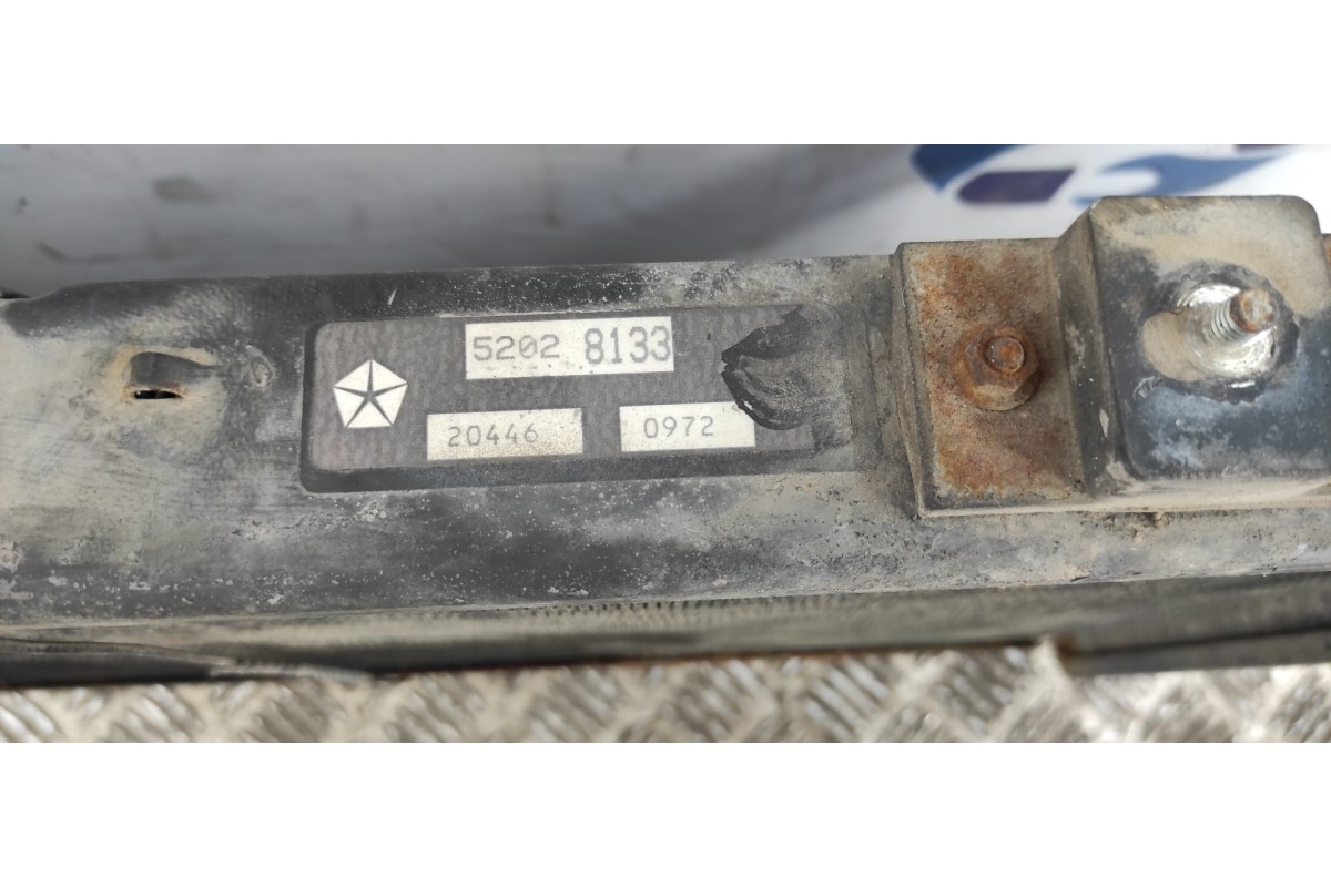Recambio de radiador agua para chrysler jeep cherokee (j) 4.0 limited referencia OEM IAM 52028133  