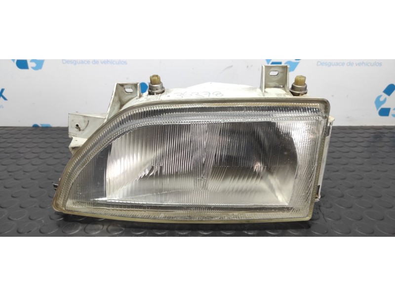 Recambio de faro izquierdo para ford escort berlina/turnier bravo lim. referencia OEM IAM 7R01472  